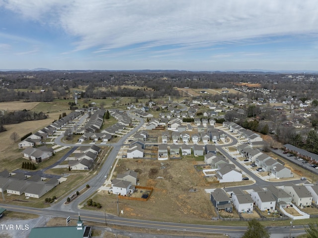 birds eye view of property with a residential view