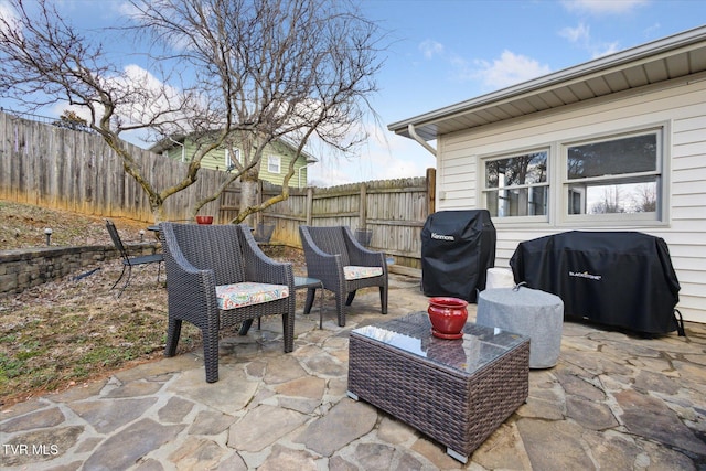 view of patio / terrace featuring a grill and a fenced backyard