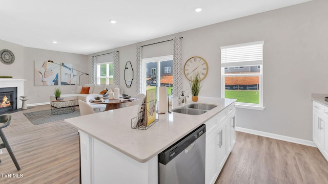 1807 Fox Meadows Cir, Bluff City, TN 37618 - kitchen featuring stainless steel dishwasher, a sink, light wood-type flooring, open floor plan, and recessed lighting