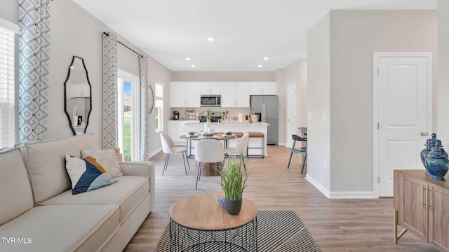 1807 Fox Meadows Cir, Bluff City, TN 37618 - living area featuring light wood finished floors, baseboards, and recessed lighting