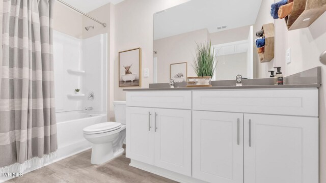 1807 Fox Meadows Cir, Bluff City, TN 37618 - bathroom featuring toilet, double vanity, and shower / tub combo with curtain