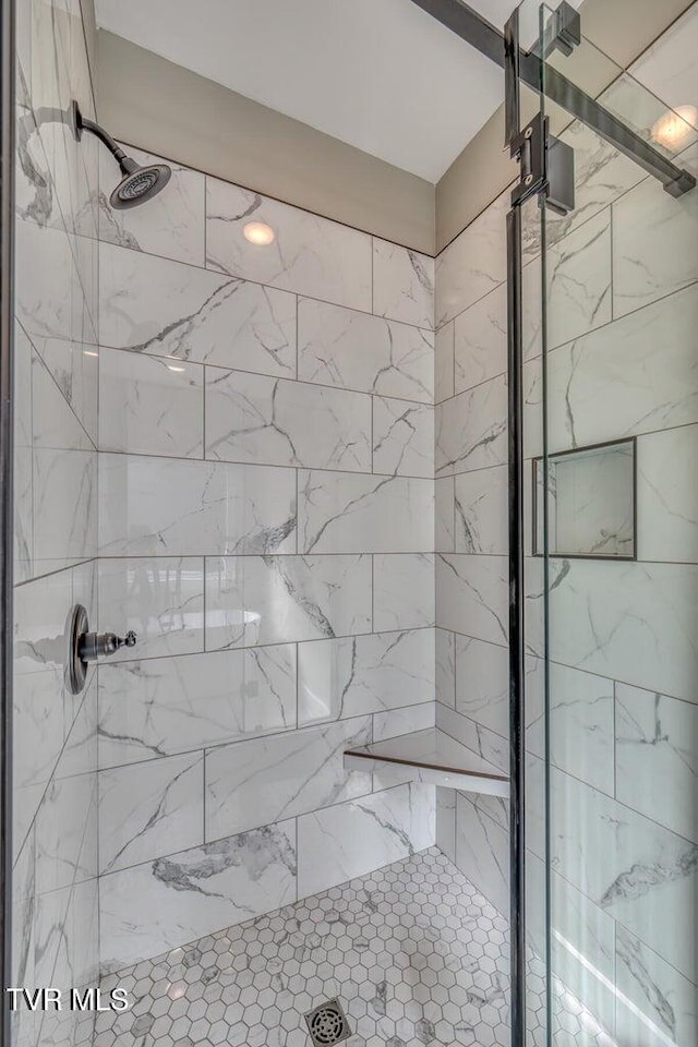 full bathroom with a stall shower