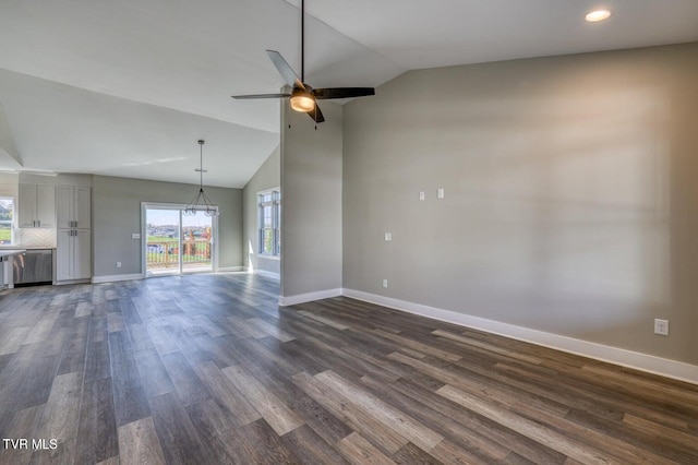 unfurnished living room featuring baseboards, recessed lighting, dark wood-style flooring, ceiling fan, and vaulted ceiling