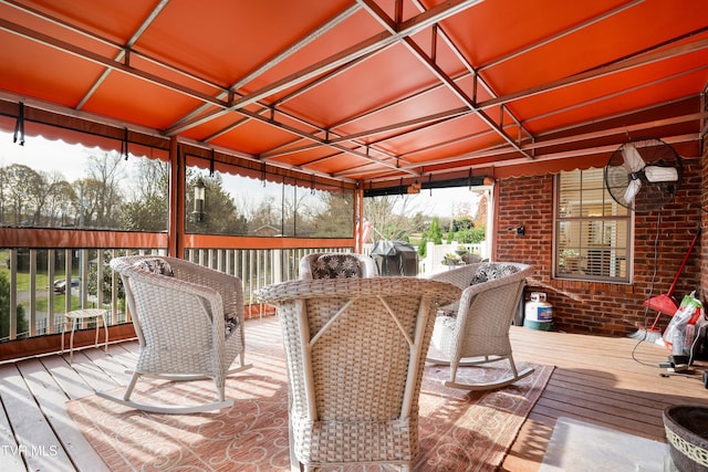 wooden deck featuring outdoor dining space