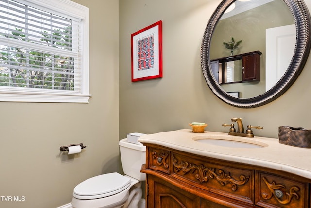 half bath with toilet and vanity