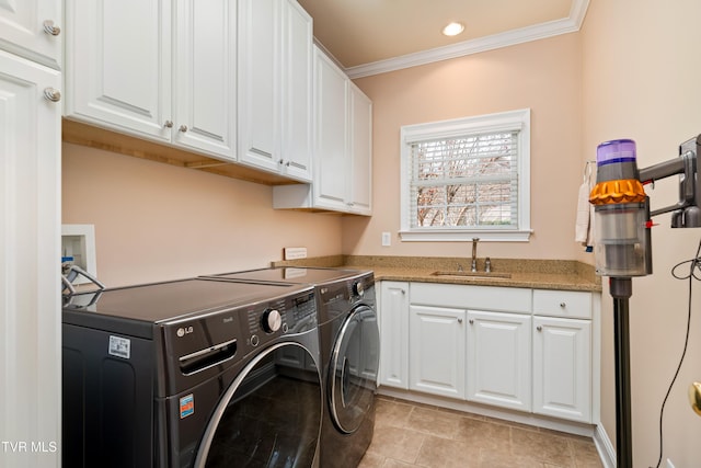 clothes washing area with recessed lighting, cabinet space, a sink, crown molding, and independent washer and dryer