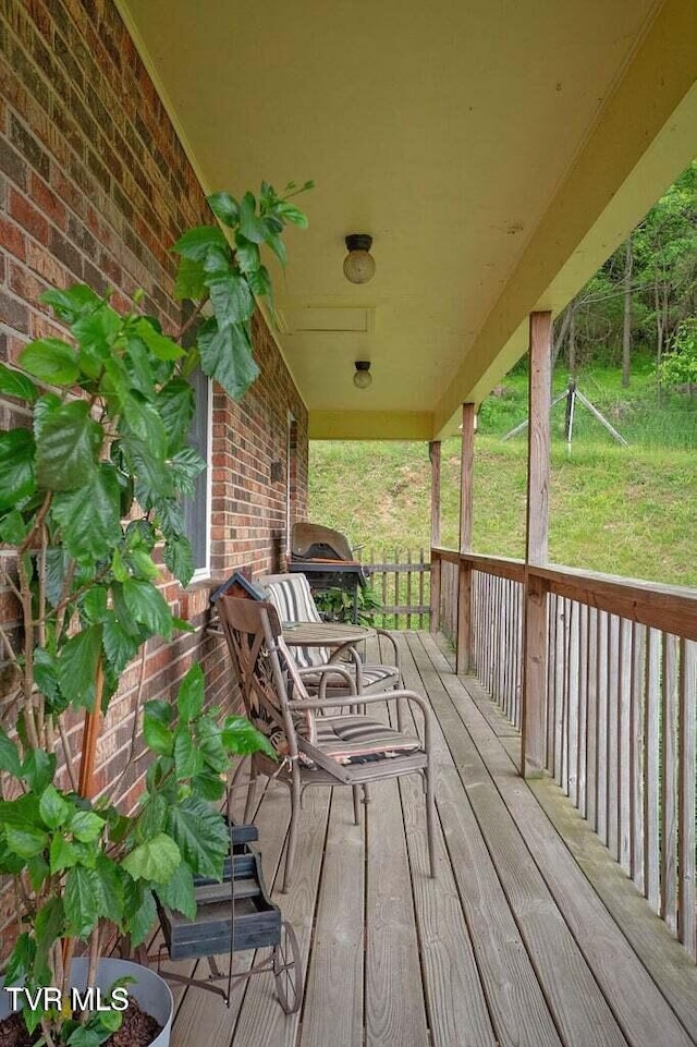 deck featuring covered porch