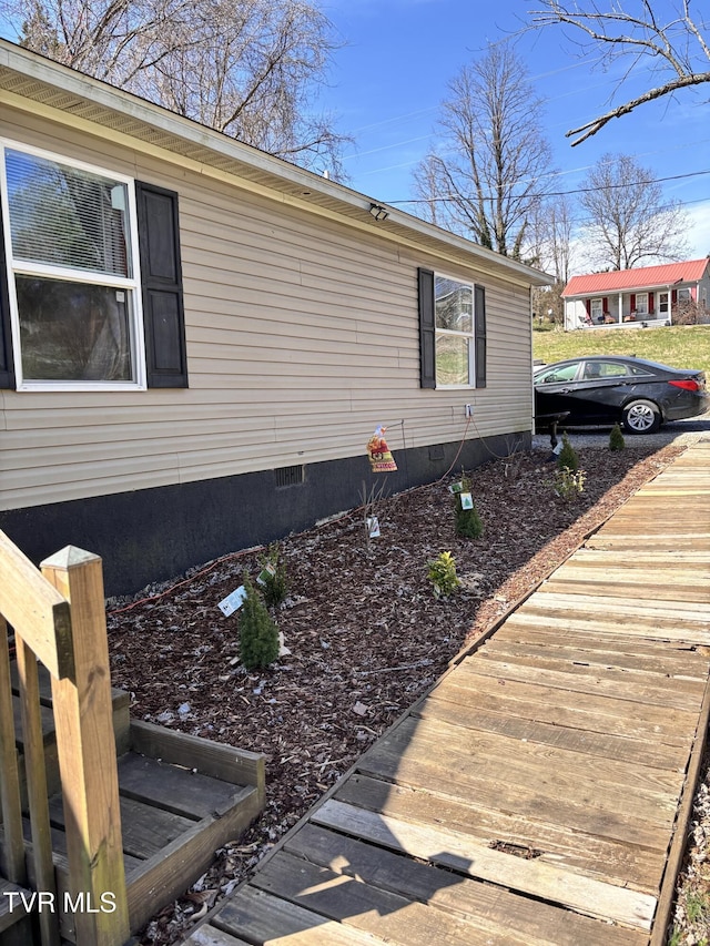 view of property exterior featuring crawl space