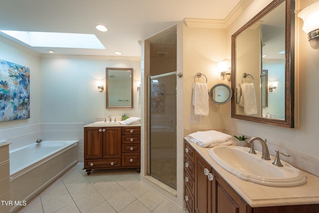 full bathroom with crown molding, a sink, and a skylight