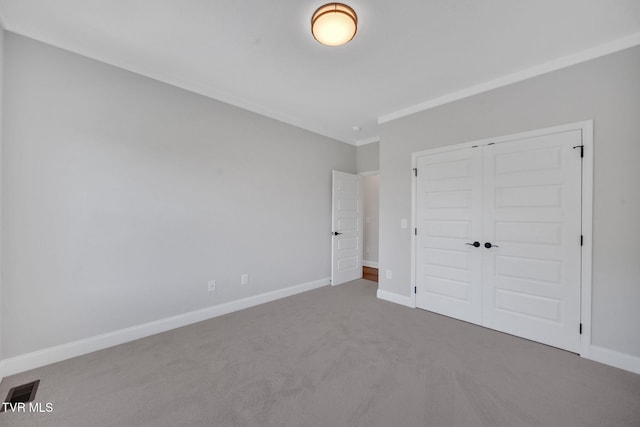 1110 Miller Dr, Jonesborough, TN 37659 - unfurnished bedroom featuring carpet floors, a closet, and crown molding