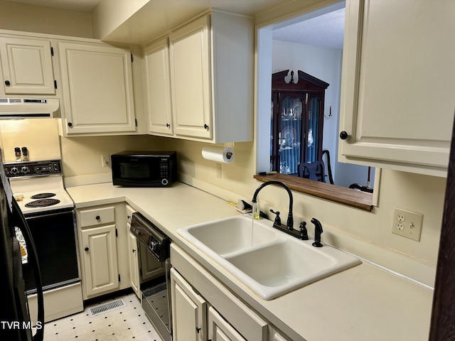 kitchen with a sink, black appliances, light countertops, under cabinet range hood, and white cabinetry