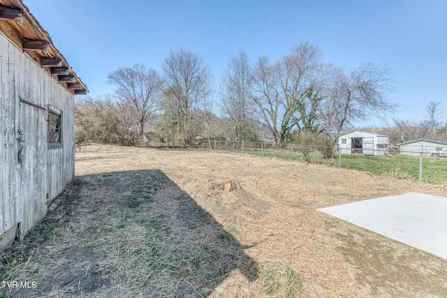 view of yard with a patio area and fence