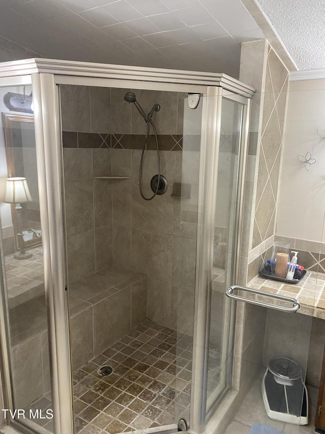 full bathroom featuring a stall shower