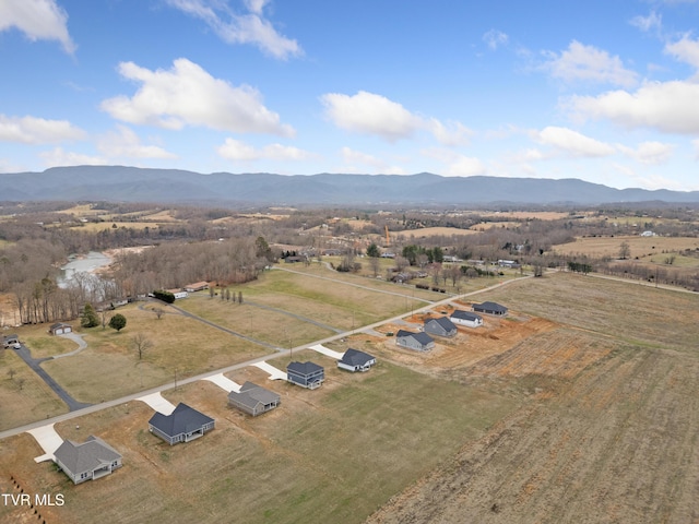 aerial view featuring a rural view and a mountain view