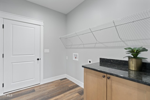 washroom with baseboards, laundry area, hookup for a washing machine, hookup for an electric dryer, and dark wood-style flooring