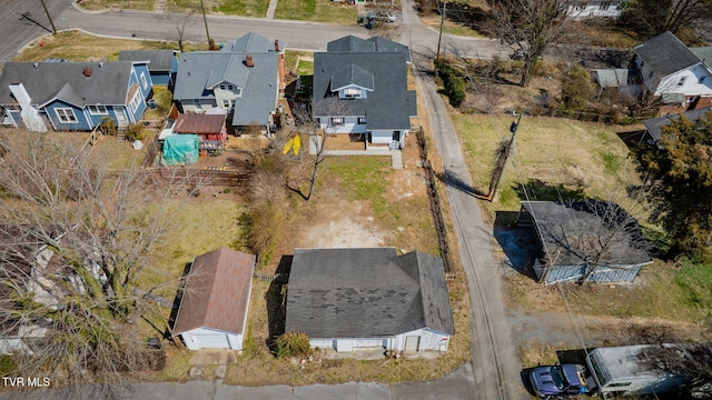 birds eye view of property with a residential view