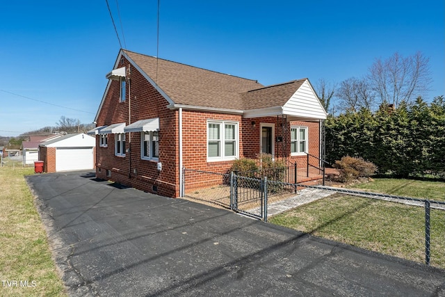 bungalow featuring an outbuilding, fence, roof with shingles, a garage, and brick siding