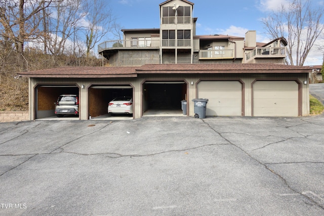 view of front of house featuring roof with shingles