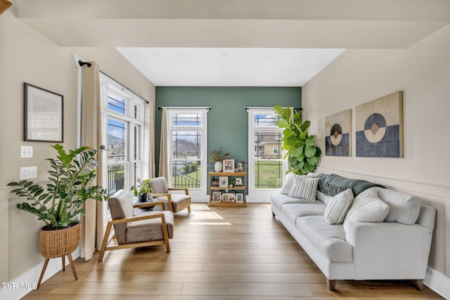 living room with wood finished floors and baseboards