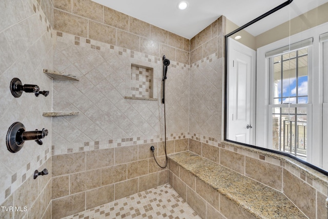 full bath with recessed lighting and tiled shower