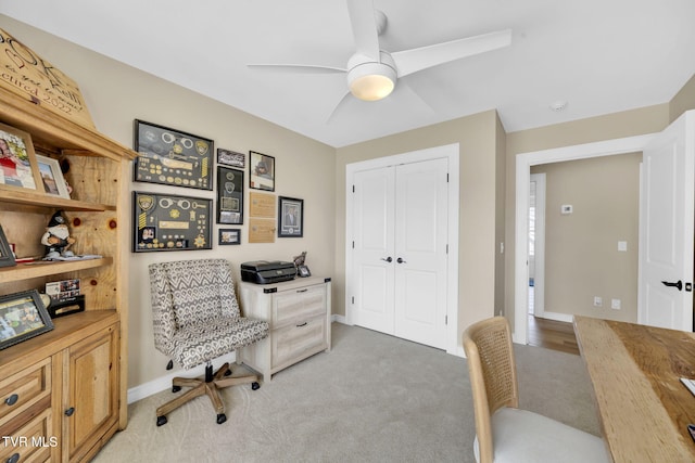 office featuring light colored carpet and ceiling fan