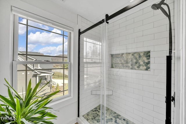 full bath featuring a stall shower