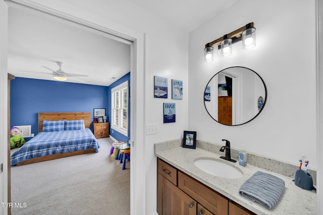 bathroom featuring vanity and ceiling fan