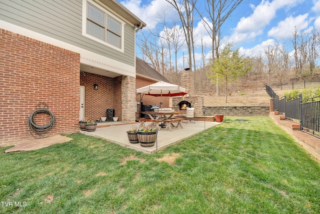 view of yard with a patio area and fence