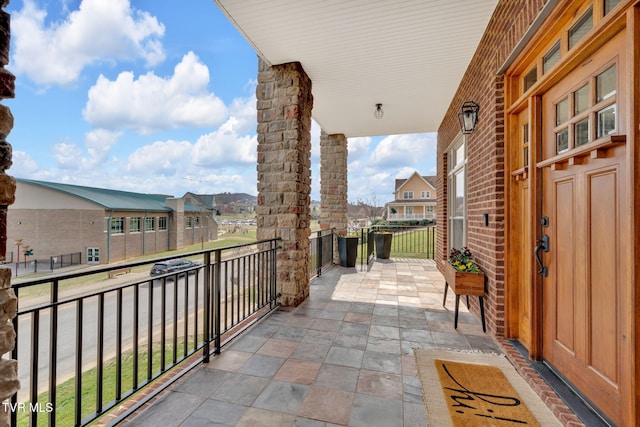 balcony featuring a residential view