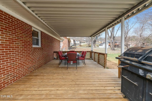 deck with outdoor dining space