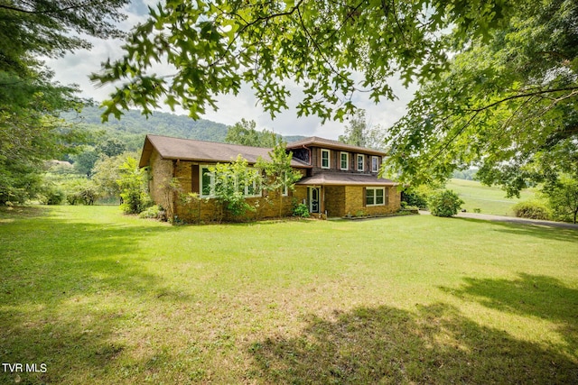 view of front of house with a front yard