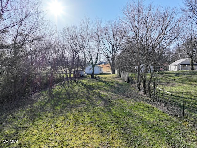 view of yard featuring fence