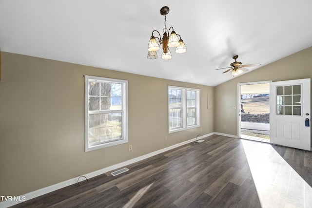 interior space with visible vents, an inviting chandelier, baseboards, dark wood-style flooring, and vaulted ceiling