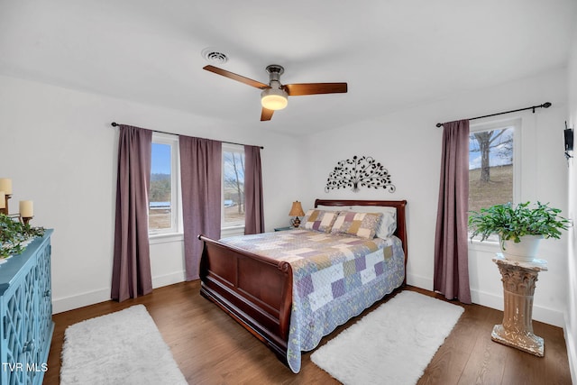 2256 Boones Creek Rd, Johnson City, TN 37615 - bedroom featuring ceiling fan, visible vents, baseboards, and wood finished floors