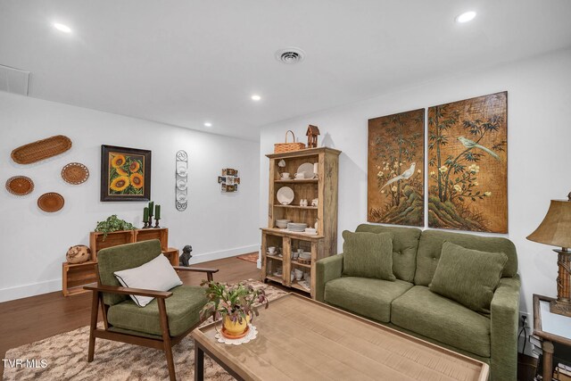2256 Boones Creek Rd, Johnson City, TN 37615 - living room featuring wood finished floors, visible vents, and baseboards
