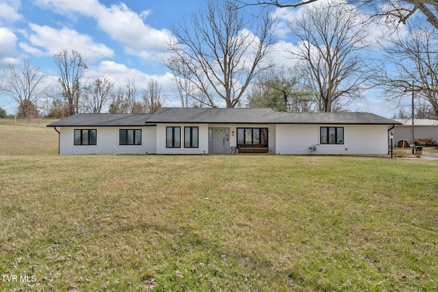 view of front of home with a front lawn