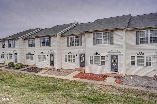 view of property with a front yard