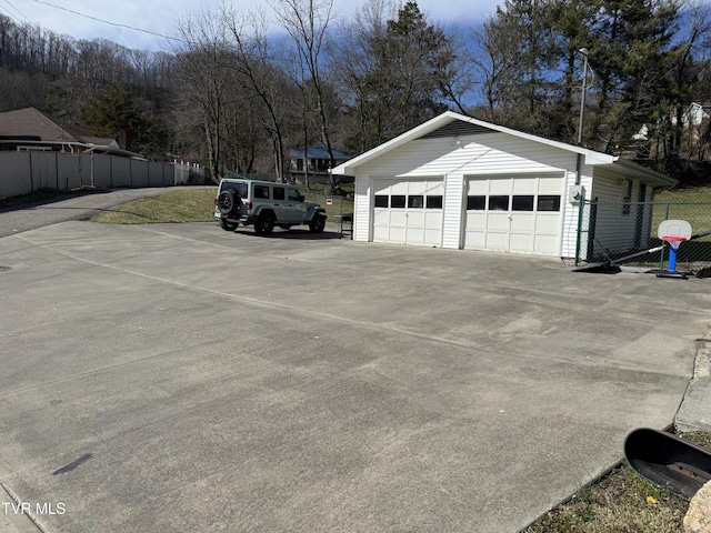 detached garage with fence