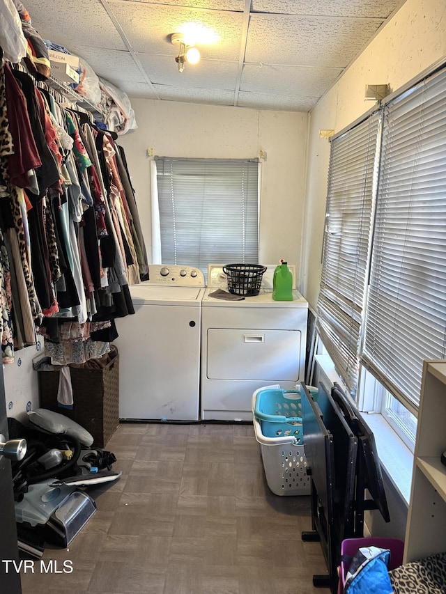 clothes washing area with laundry area and independent washer and dryer