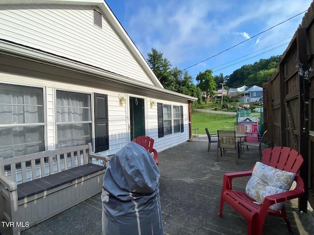 view of patio / terrace featuring a grill and outdoor dining space