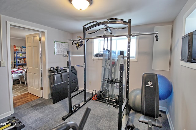 exercise room with baseboards