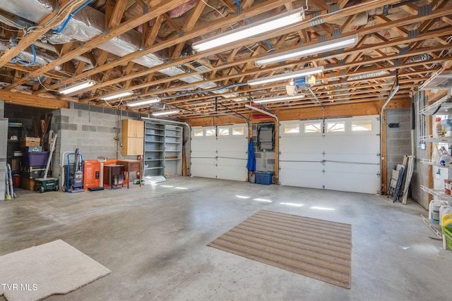 garage featuring concrete block wall