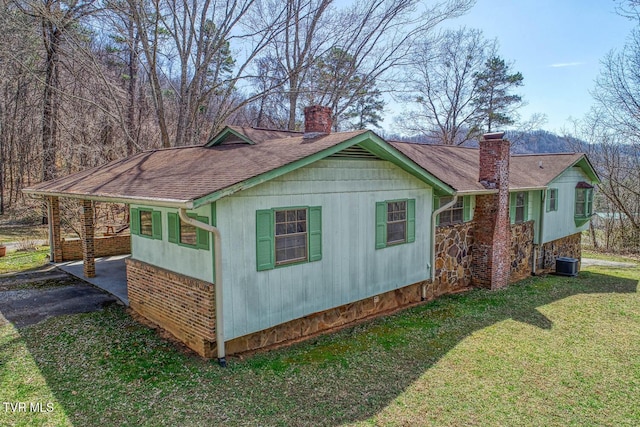 view of outdoor structure with central AC