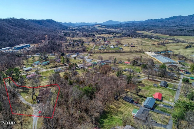 aerial view featuring a mountain view and a rural view