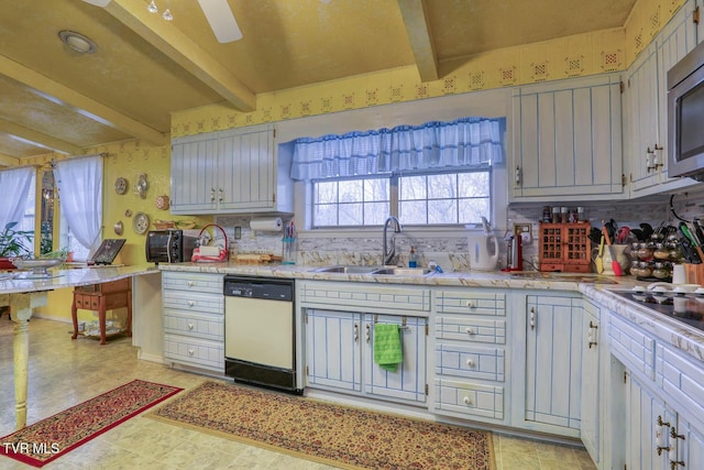 kitchen featuring stainless steel microwave, beamed ceiling, dishwasher, light countertops, and a sink