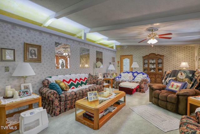 living room featuring carpet, ceiling fan, and wallpapered walls