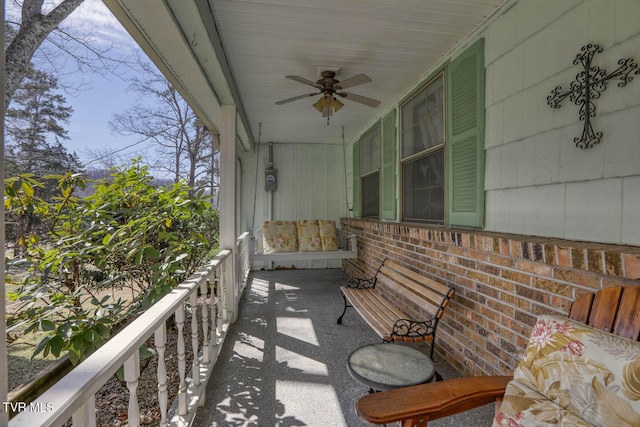 balcony featuring a ceiling fan