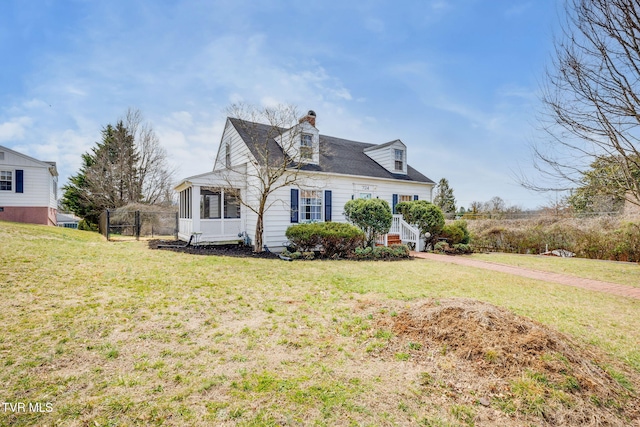 view of front of house with a front lawn