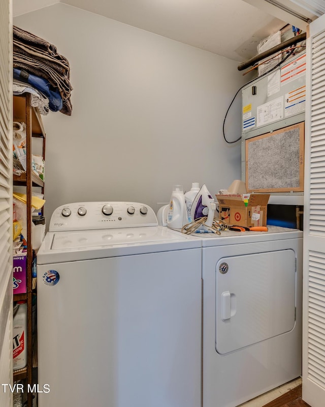 laundry area with washing machine and dryer and laundry area