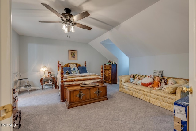 bedroom with baseboards, ceiling fan, carpet flooring, and vaulted ceiling